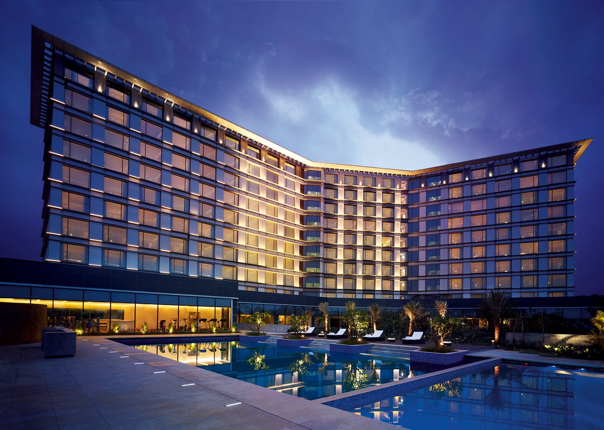 Five-star business hotel with poolside deck at night